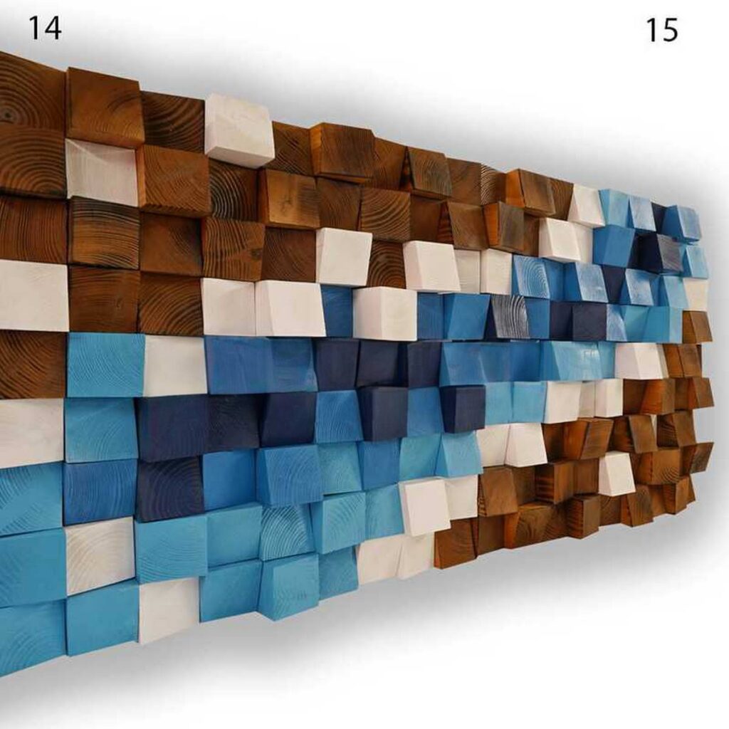 Vue de face d’une composition de diffuseurs d’art motifs 14 et 15 en grain fin, formée de cubes en relief disposés en alternance dans des tons brun miel, bleu clair, bleu profond et blanc, avec une ligne centrale claire qui accentue le contraste et le veinage fin du bois.