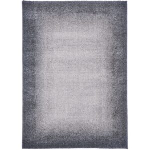 pure-tone-tapis-acoustique-gris-vue-complete Vue complète du tapis acoustique Pure Tone gris, présentant un centre gris clair chiné qui évolue progressivement vers une large bordure gris anthracite.