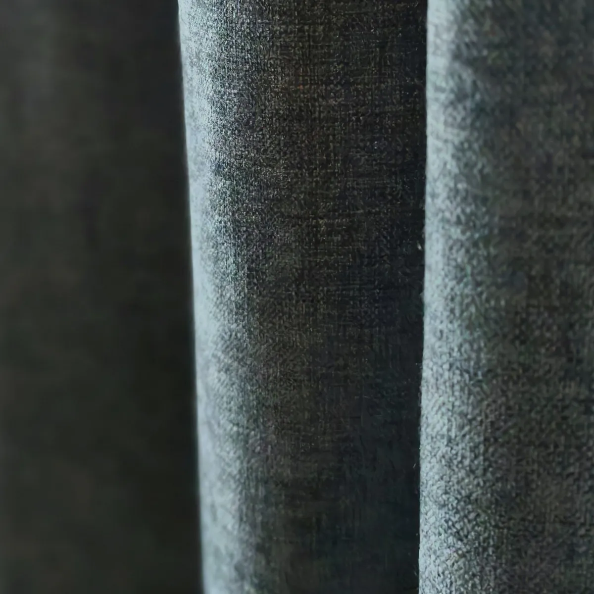 Détail tissu vert rideau absorbant acoustique Tesla