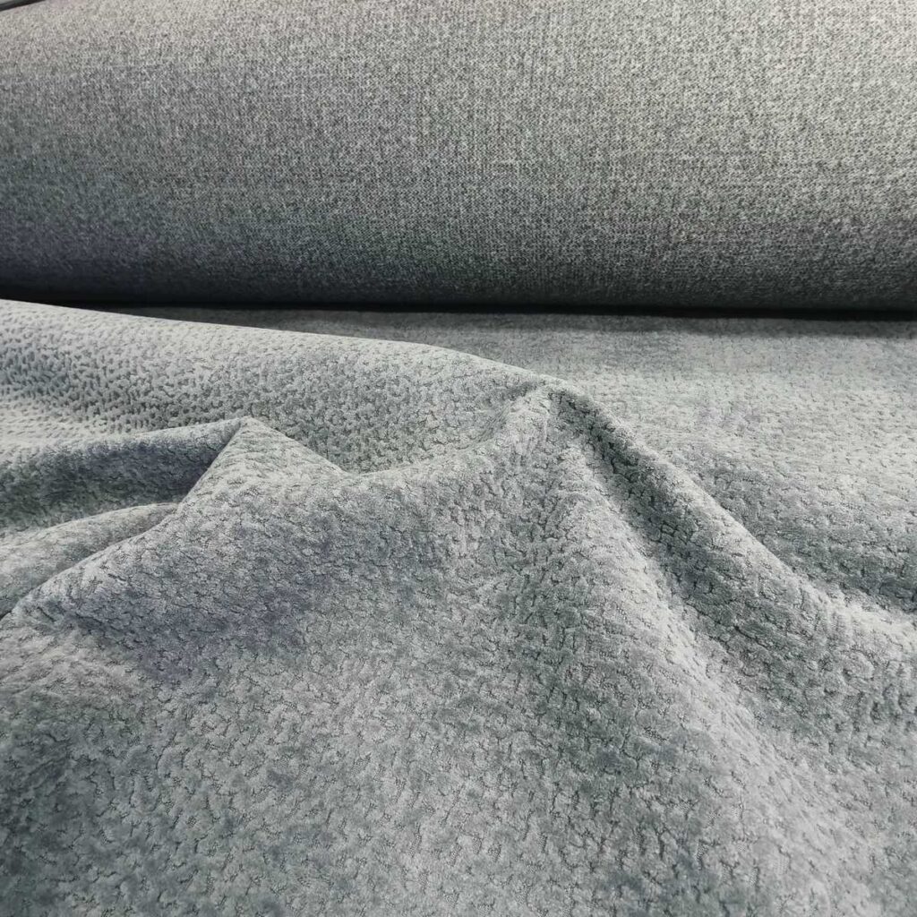 Tissu acoustique Jaguar gris avec texture douce et relief