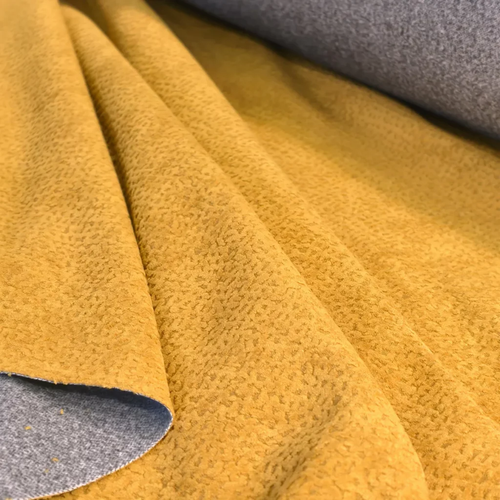 Tissu isolant thermique couture Jaguar jaune texture