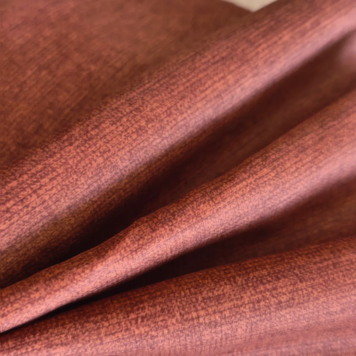 Détail des plis du tissu Ross avec texture textile visible